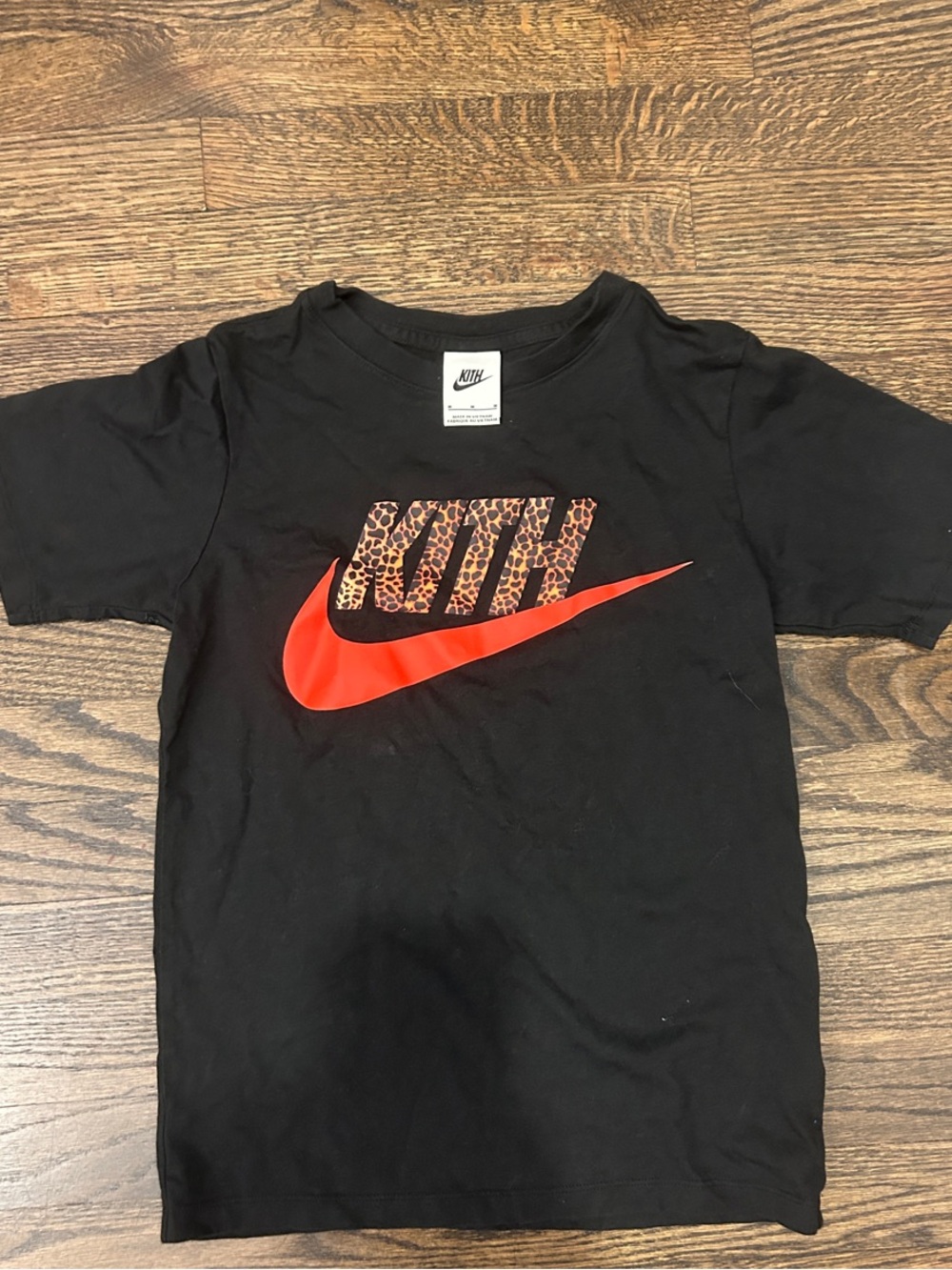 Nike Black Tee with Red Swoosh and Leopard Print Accents
